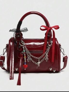 NWOT Deep Red Vegan Leather Handbag with Crossbody Strap and Bag charms